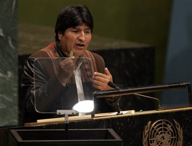 Bolivian president Evo Morales holds a coca leaf as he addresses the 61st session of the U.N. General Assembly at the United Nations headquarters, Tuesday, Sept. 19, 2006